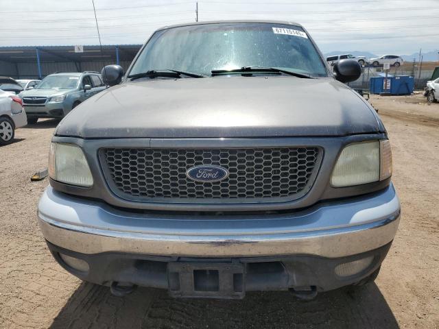 Photo 5 from auction – 2003 FORD F150 SUPER with VIN 1FTRW08L23KC55519
