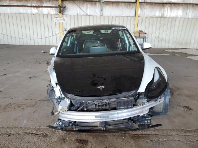 Photo 5 from auction – 2023 TESLA MODEL 3 with VIN 5YJ3E1EA4PF620982