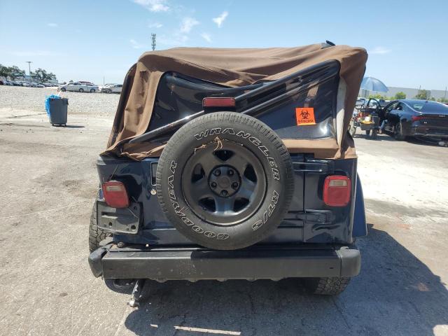 Photo 6 from auction – 2003 JEEP WRANGLER COMMANDO with VIN 1J4FA39S43P357281