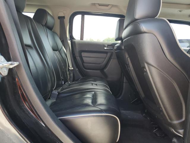 Photo 11 from auction – 2007 HUMMER H3 with VIN 5GTDN13E778229943