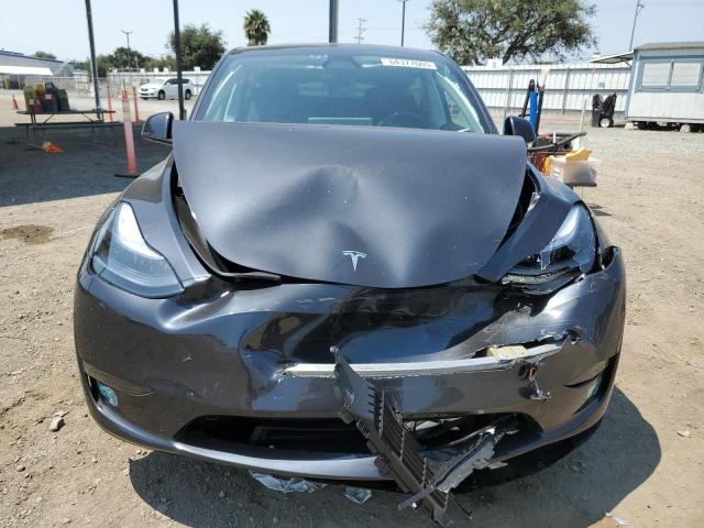 Photo 5 from auction – 2025 TESLA MODEL Y with VIN 7SAYGDED5SF313490