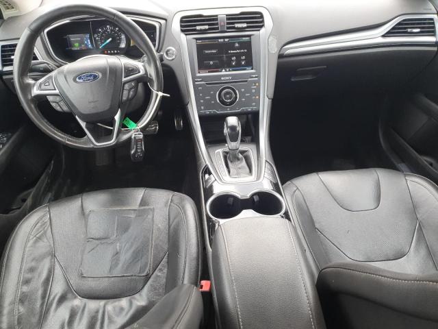Photo 8 from auction – 2014 FORD FUSION TITANIUM PHEV with VIN 3FA6P0SU7ER220741