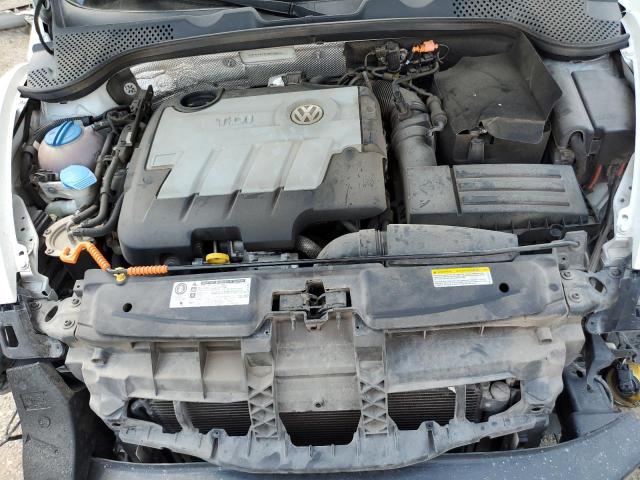 Photo 11 from auction – 2014 VOLKSWAGEN BEETLE with VIN 3VWJL7AT4EM656653