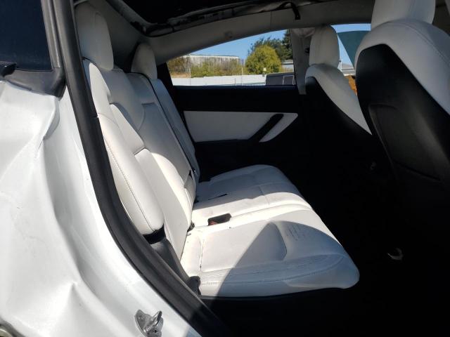 Photo 11 from auction – 2022 TESLA MODEL Y with VIN 7SAYGAEE7NF429785