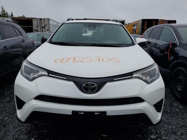 Photo 5 from auction – 2018 TOYOTA RAV4 LE with VIN 2T3BFREVXJW822060