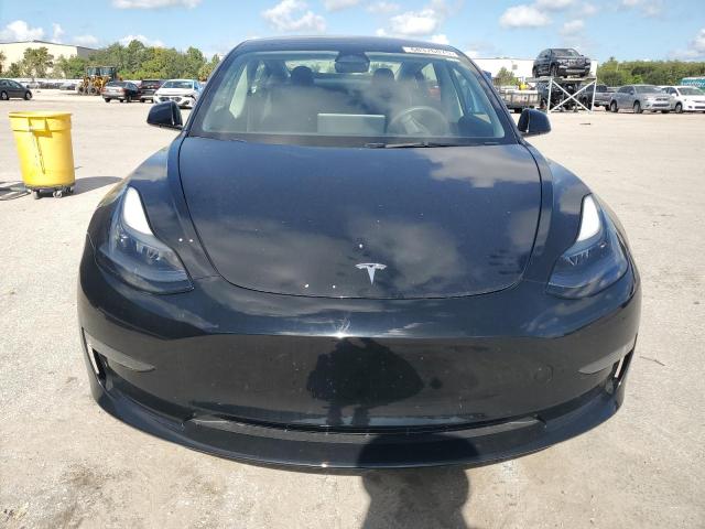Photo 5 from auction – 2023 TESLA MODEL 3 with VIN 5YJ3E1EA2PF639689