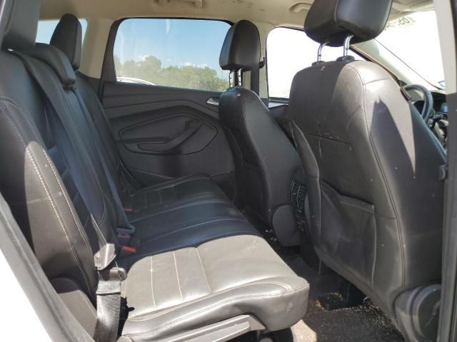 Photo 11 from auction – 2016 FORD ESCAPE SE with VIN 1FMCU9GX3GUB10189