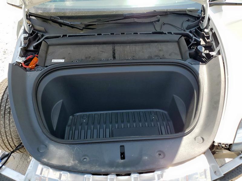 Photo 11 from auction – 2023 TESLA MODEL Y with VIN 7SAYGDEE8PA120148