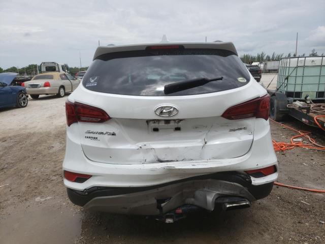 Photo 6 from auction – 2018 HYUNDAI SANTA FE S with VIN 5NMZU3LB7JH059591