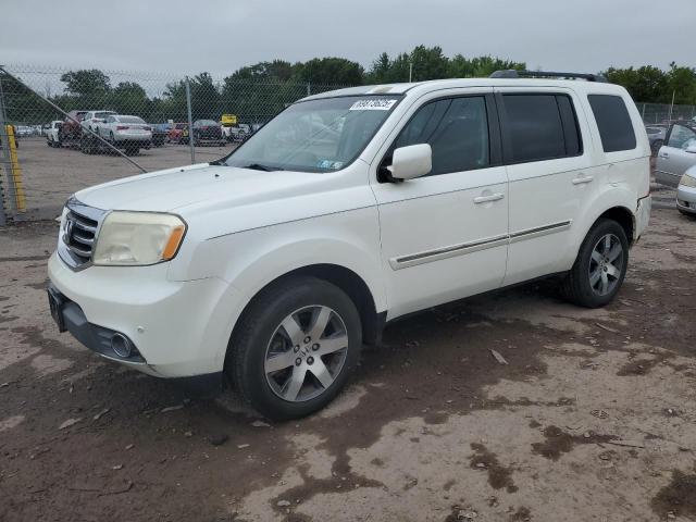 HONDA PILOT TOUR 2012 with VIN 5FNYF4H94CB081487 - Photo from auction
