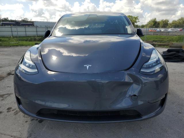 Photo 5 from auction – 2023 TESLA MODEL Y with VIN 7SAYGDEE2PA142890