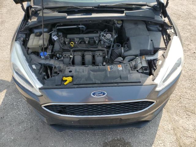 Photo 11 from auction – 2016 FORD FOCUS S with VIN 1FADP3E21GL386161