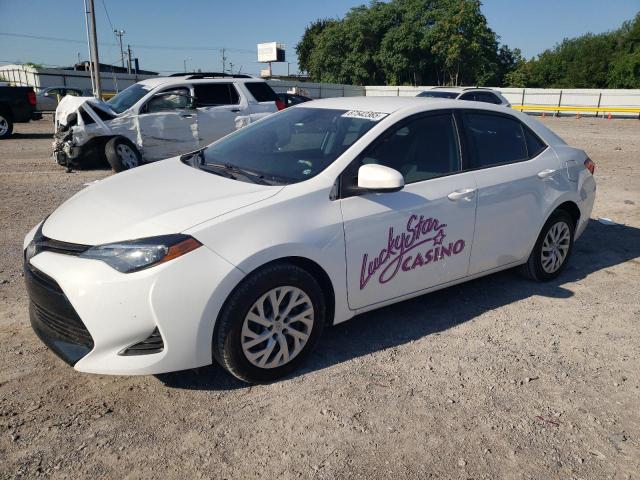 TOYOTA COROLLA L 2019 with VIN 5YFBURHEXKP891554 - Photo from auction