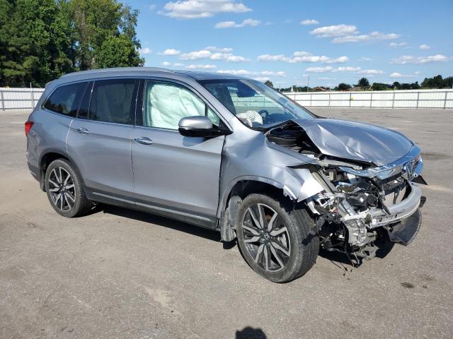 Photo 4 from auction – 2020 HONDA PILOT TOURING with VIN 5FNYF6H92LB065820