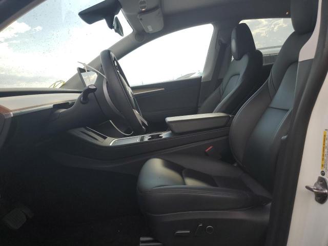 Photo 7 from auction – 2023 TESLA MODEL Y with VIN 7SAYGDEE6PA068597
