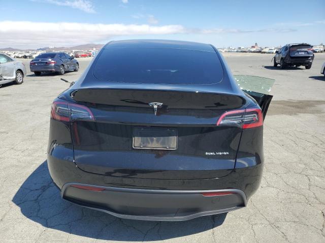 Photo 6 from auction – 2023 TESLA MODEL Y with VIN 7SAYGAEE3PF903721