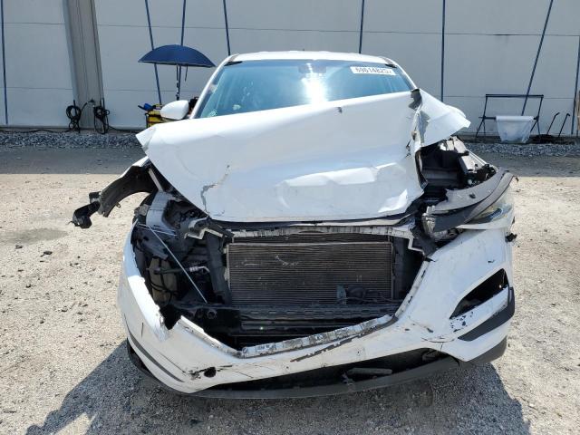 Photo 5 from auction – 2018 HYUNDAI TUCSON SE with VIN KM8J2CA48JU820267