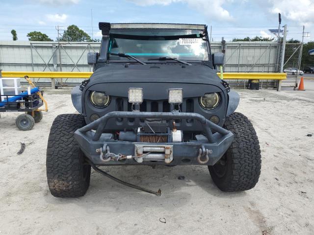 Photo 5 from auction – 2010 JEEP WRANGLER U with VIN 1J4BA5H10AL144027