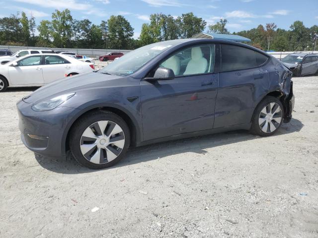 TESLA MODEL Y 2022 with VIN 7SAYGAEE2NF382147 - Photo from auction