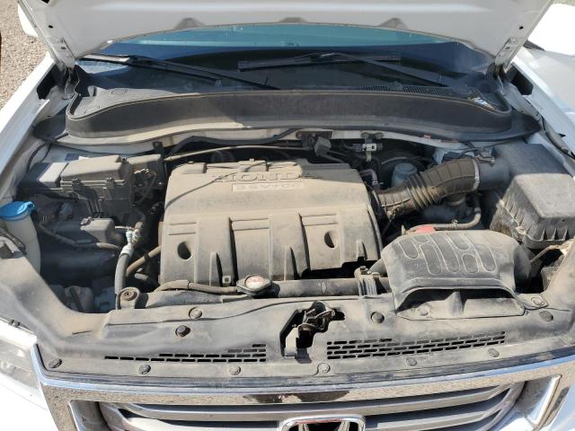 Photo 12 from auction – 2013 HONDA RIDGELINE RTL with VIN 5FPYK1F59DB018016