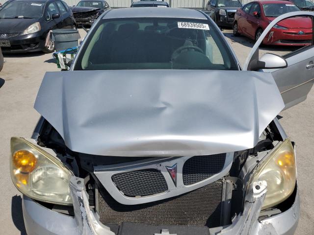 Photo 11 from auction – 2009 PONTIAC G5 with VIN 1G2AS18H597240779