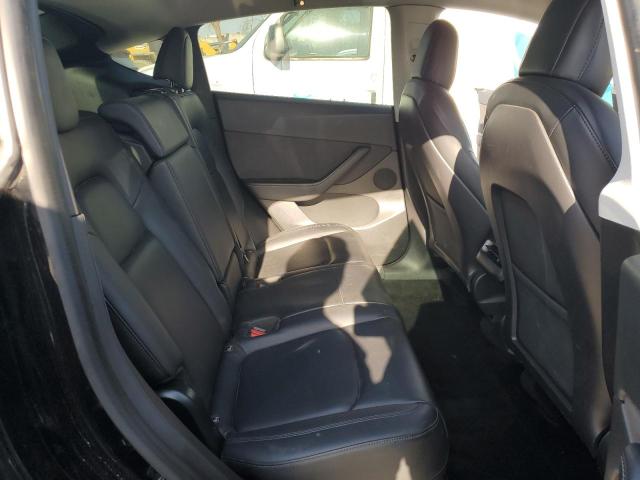 Photo 11 from auction – 2021 TESLA MODEL Y with VIN 5YJYGDEE6MF067610