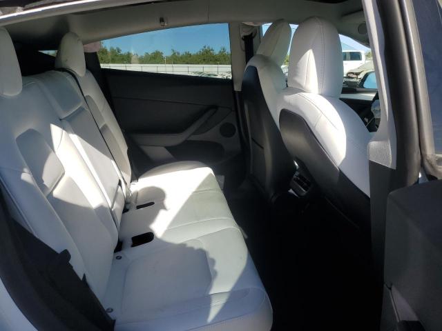 Photo 10 from auction – 2023 TESLA MODEL Y with VIN 7SAYGDEE1PF603564