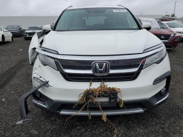 Photo 5 from auction – 2021 HONDA PILOT ELIT with VIN 5FNYF6H01MB087682
