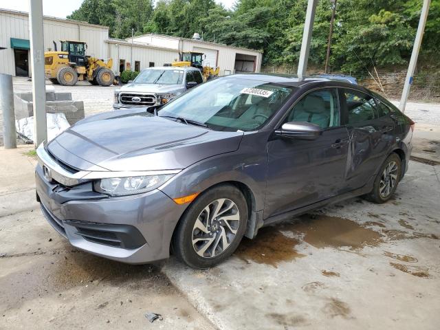 HONDA CIVIC EX 2018 with VIN 19XFC2F75JE023655 - Photo from auction
