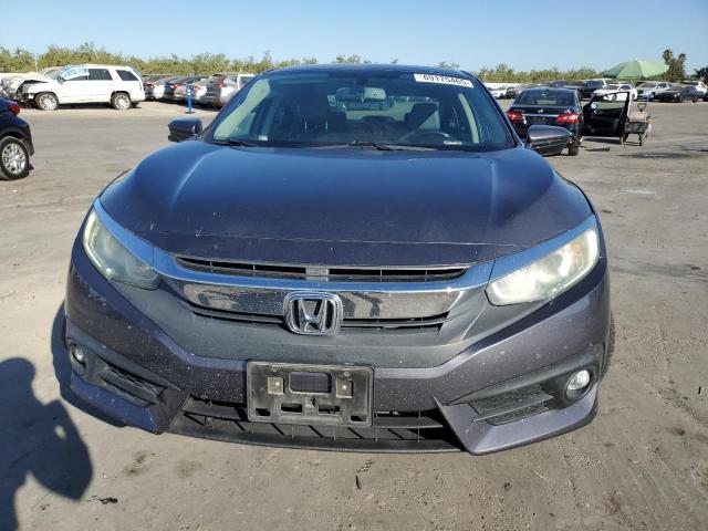 Photo 5 from auction – 2016 HONDA CIVIC EXL with VIN 19XFC1F75GE202118