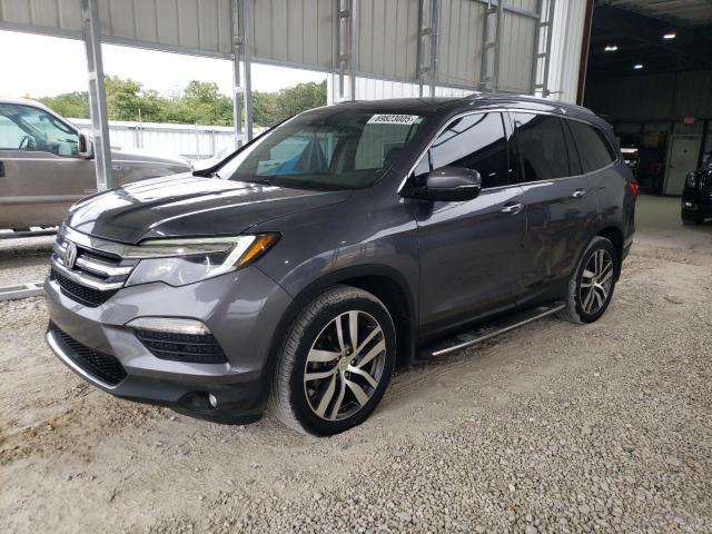 HONDA PILOT ELIT 2016 with VIN 5FNYF6H02GB098887 - Photo from auction