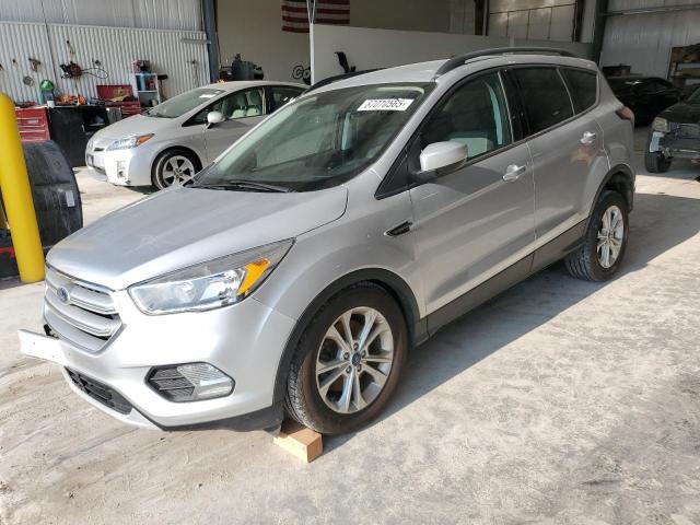 FORD ESCAPE SE 2018 with VIN 1FMCU9GD8JUB84155 - Photo from auction