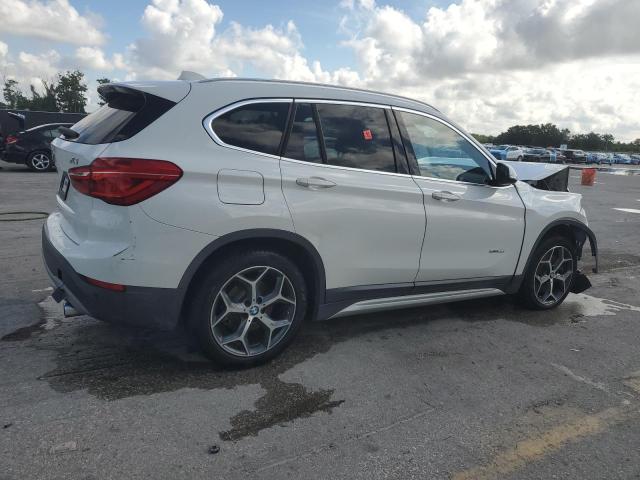 Photo 3 from auction – 2016 BMW X1 XDRIVE2 with VIN WBXHT3C32G5E49989