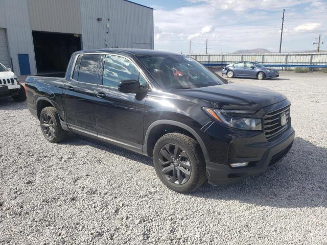 Photo 4 from auction – 2023 HONDA RIDGELINE with VIN 5FPYK3F12PB049170