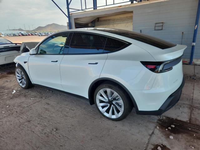 Photo 2 from auction – 2026 TESLA MODEL Y with VIN 7SAYGDEE3TF329732