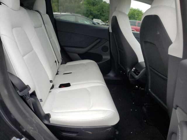 Photo 11 from auction – 2025 TESLA MODEL Y with VIN 7SAYGAEE9SF294644
