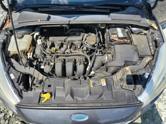 Photo 11 from auction – 2015 FORD FOCUS SE with VIN 1FADP3F23FL262860