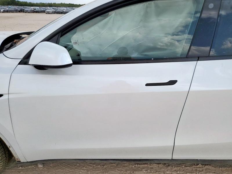 Photo 7 from auction – 2023 TESLA MODEL Y with VIN 7SAYGDEE7PA094304