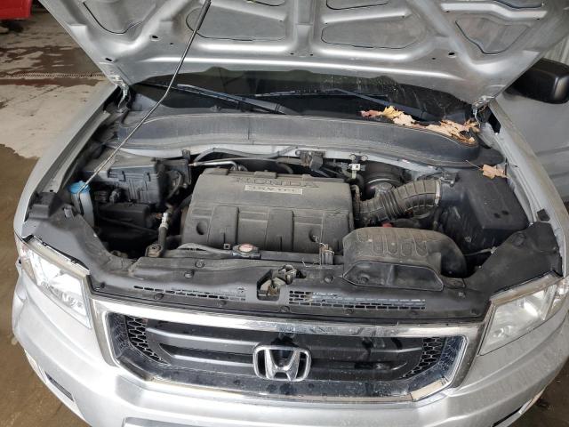 Photo 11 from auction – 2009 HONDA RIDGELINE with VIN 5FPYK16239B107318