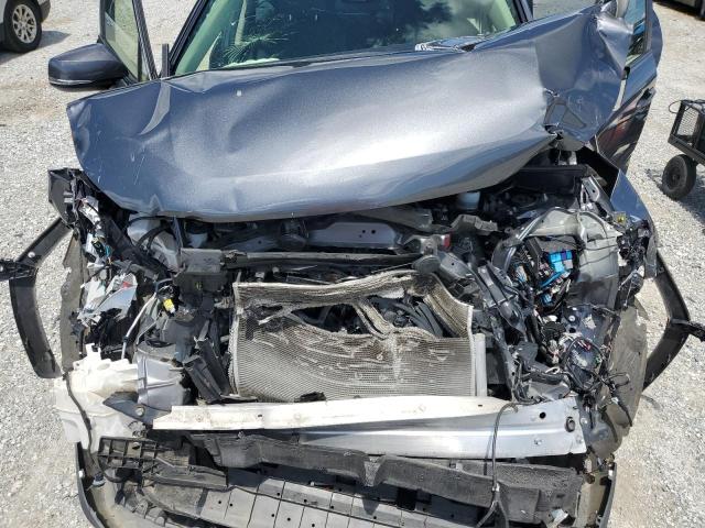Photo 12 from auction – 2021 TOYOTA RAV4 XLE with VIN JTMP1RFV2MD075879