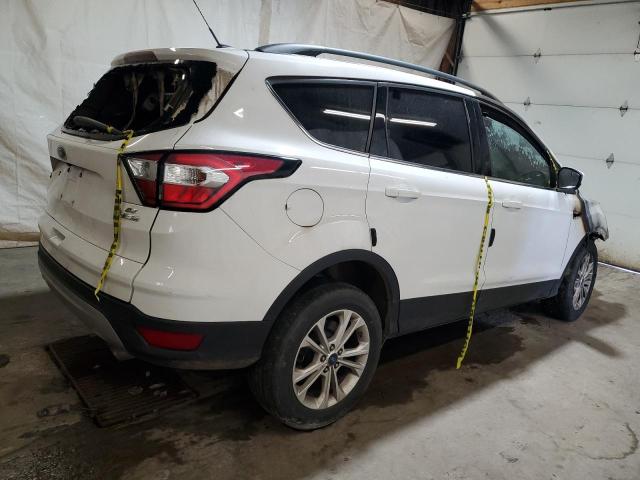 Photo 3 from auction – 2018 FORD ESCAPE SE with VIN 1FMCU9GD8JUB34565