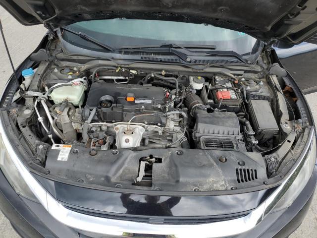 Photo 11 from auction – 2018 HONDA CIVIC LX with VIN 19XFC2E56JE021879