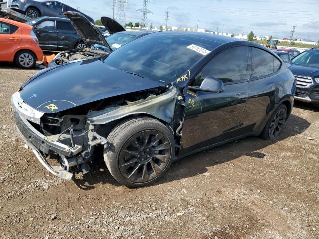 TESLA MODEL Y 2024 with VIN 7SAYGAEEXRF016023 - Photo from auction