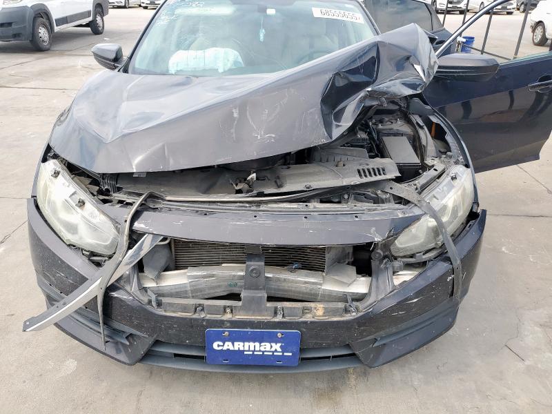 Photo 11 from auction – 2016 HONDA CIVIC LX with VIN 19XFC2F54GE222820