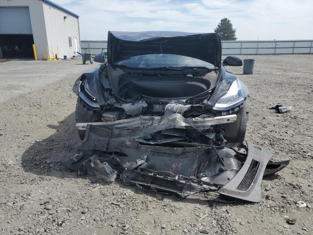 Photo 5 from auction – 2021 TESLA MODEL 3 with VIN 5YJ3E1EB5MF002347