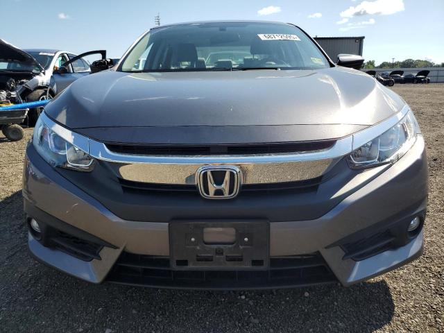 Photo 5 from auction – 2018 HONDA CIVIC EX with VIN JHMFC1F32JX022677