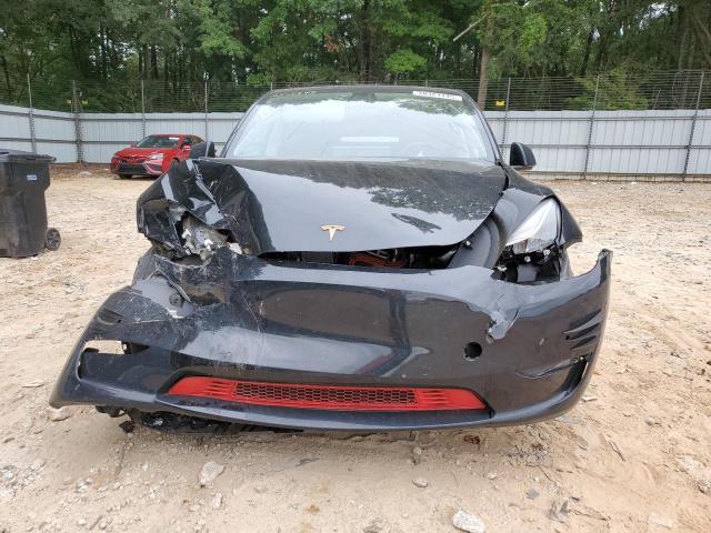 Photo 5 from auction – 2021 TESLA MODEL Y with VIN 5YJYGDEE5MF158576