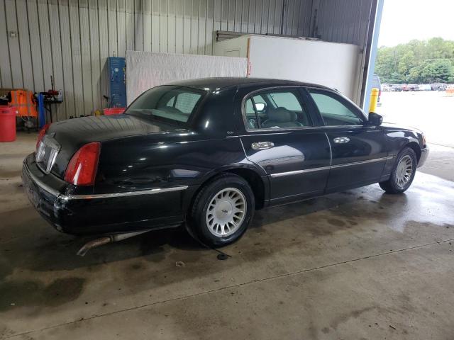 Photo 3 from auction – 2000 LINCOLN TOWN CAR C with VIN 1LNHM83W7YY844499