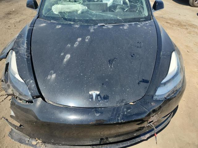 Photo 11 from auction – 2019 TESLA MODEL 3 with VIN 5YJ3E1EA1KF410073