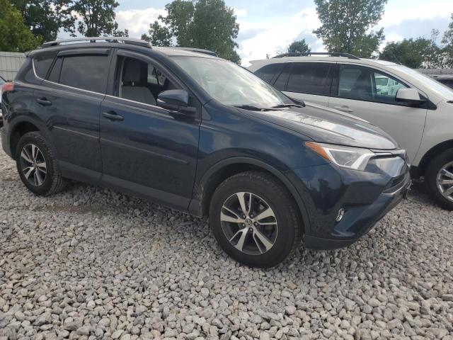 Photo 4 from auction – 2017 TOYOTA RAV4 XLE with VIN 2T3RFREV0HW661565